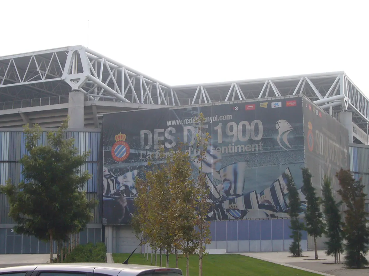 Exterior of RCD Espanyol's stadium at Cornellà-El Prat near Barcelona, with a large club banner on the facade