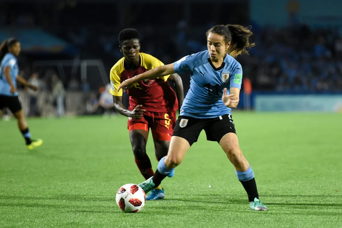 Ghana's Black Maidens in white attacking against Uruguay at the 2018 FIFA U-17 Women's World Cup at Estadio Charrúa in Montevideo